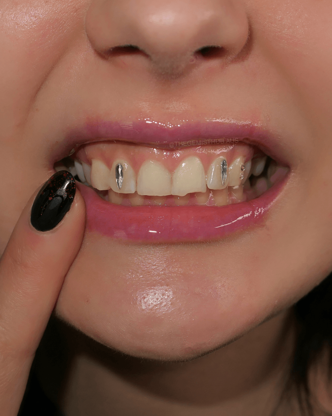 Dental bonding materials for tooth gems